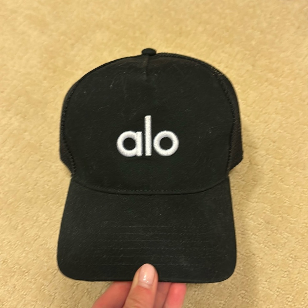 black alo trucker hat